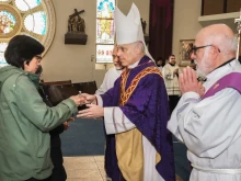 Archbishop Salvatore Cordileone receiving the gifts during Mass in 2021.